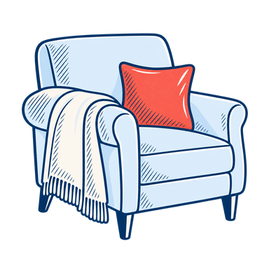 Fauteuil bleu avec plaid clair et coussin corail